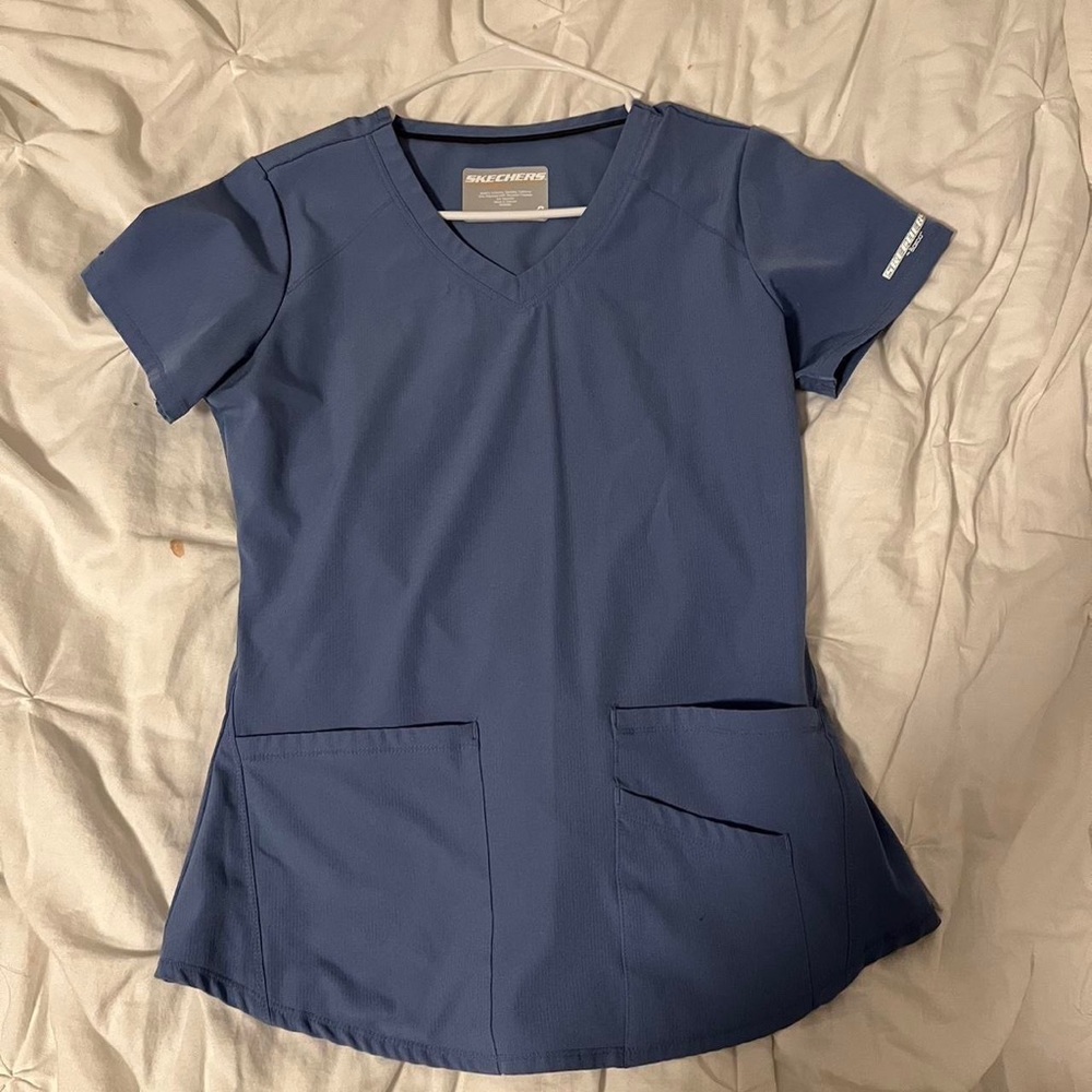 Skechers Ciel Blue scrub top. Size XS